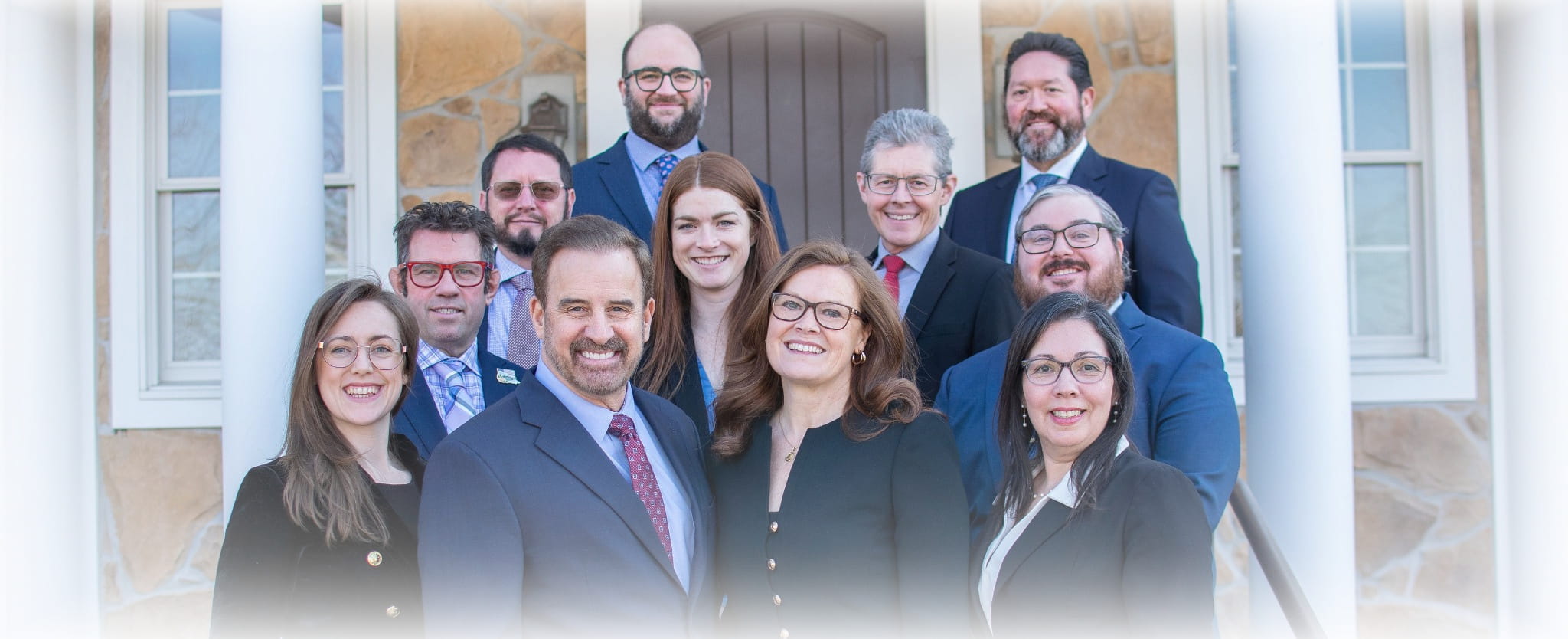 Holcomb-Attorney-Group-photo-outside-new